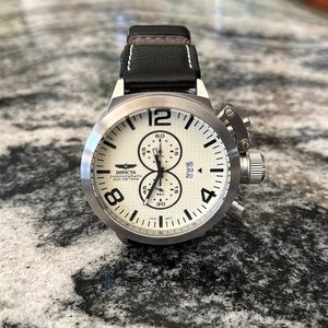 Men’s Invicta watch cream colored face with silver frame and black leather band